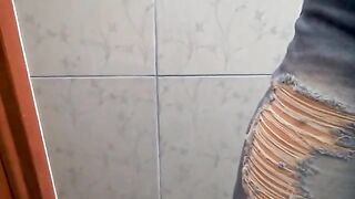 mature MILF jerks off in the toilet