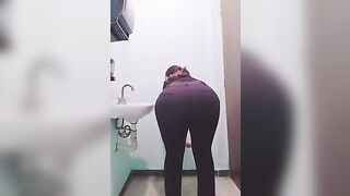 Sexy Mexican mature sexy MILF secretary with a big butt takes off her uniform at the office and shows her nice and sensual ass